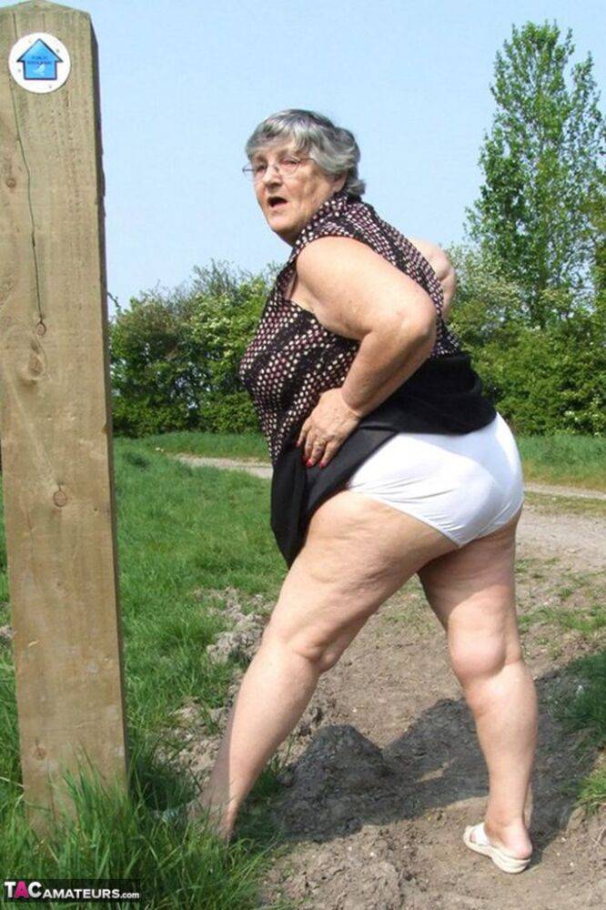 Horny granny Grandma Libby exposes massive big tits and huge ass at the farm - #7