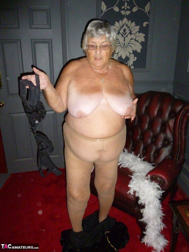 Fat nan Grandma Libby wears a feather boa while baring her saggy tits and butt - #4