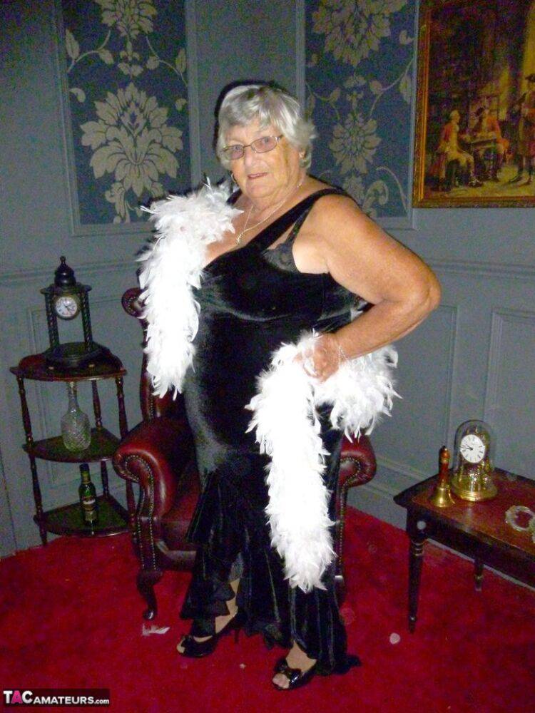 Fat nan Grandma Libby wears a feather boa while baring her saggy tits and butt - #11