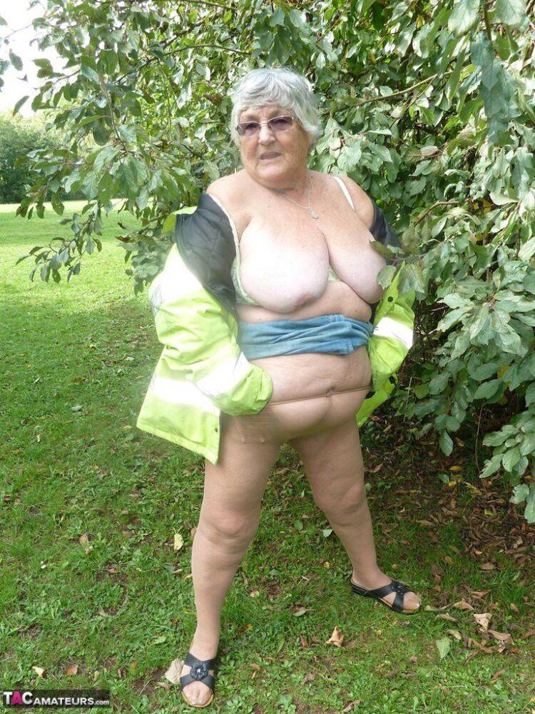 Fat British woman Grandma Libby exposes herself by a tree in a park - #7