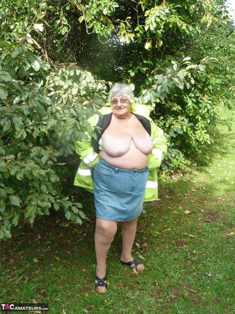 Fat British woman Grandma Libby exposes herself by a tree in a park - #9