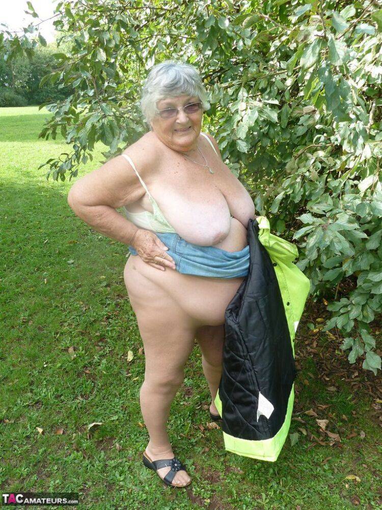 Fat British woman Grandma Libby exposes herself by a tree in a park - #6