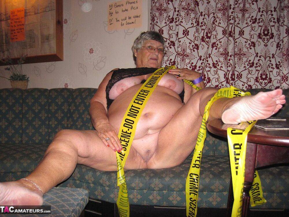 Obese granny Grandma Libby wraps her mostly naked body in crime scene tape - #11