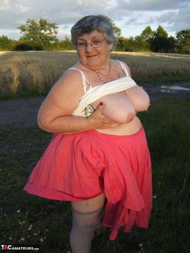 Obese oma Grandma Libby exposes her huge ass while in a field by a rural road - #14