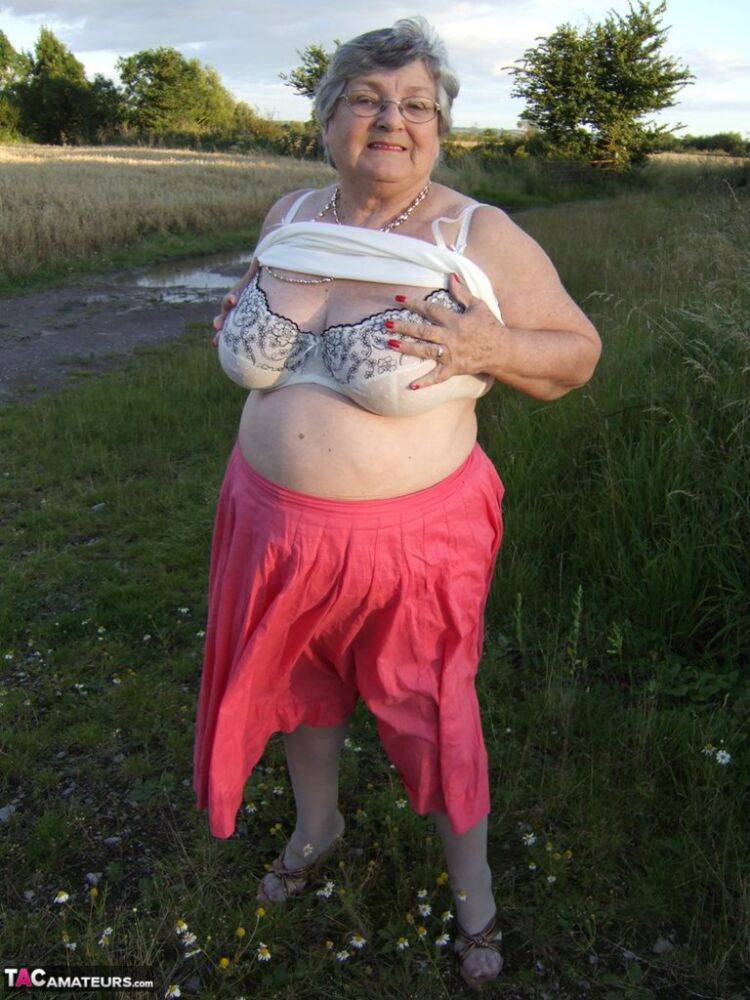 Obese oma Grandma Libby exposes her huge ass while in a field by a rural road - #1