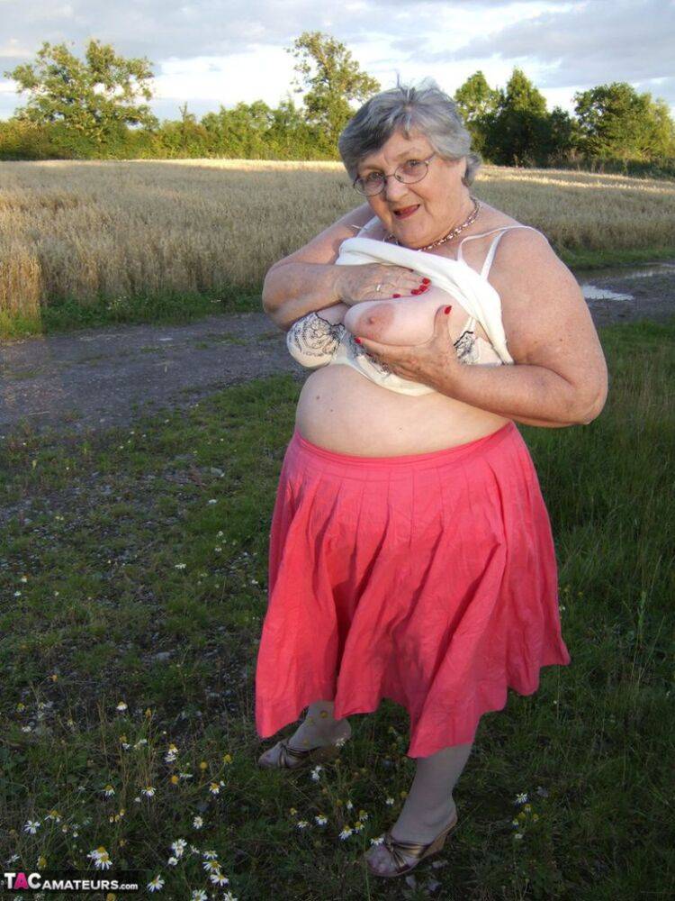 Obese oma Grandma Libby exposes her huge ass while in a field by a rural road - #6