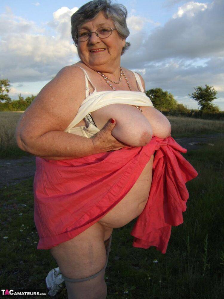 Obese oma Grandma Libby exposes her huge ass while in a field by a rural road - #4
