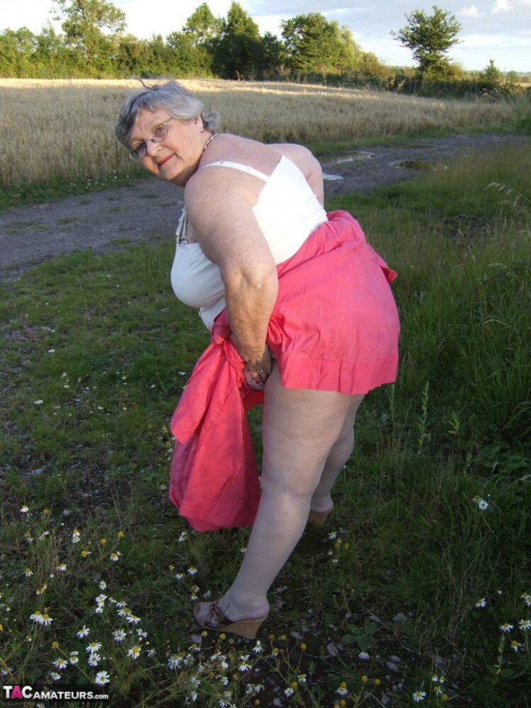 Obese oma Grandma Libby exposes her huge ass while in a field by a rural road - #8