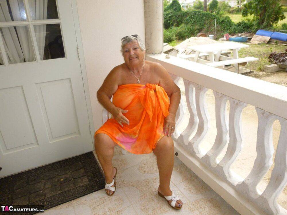 Fat oma Grandma Libby exposes her tan lined body on a balcony - #5