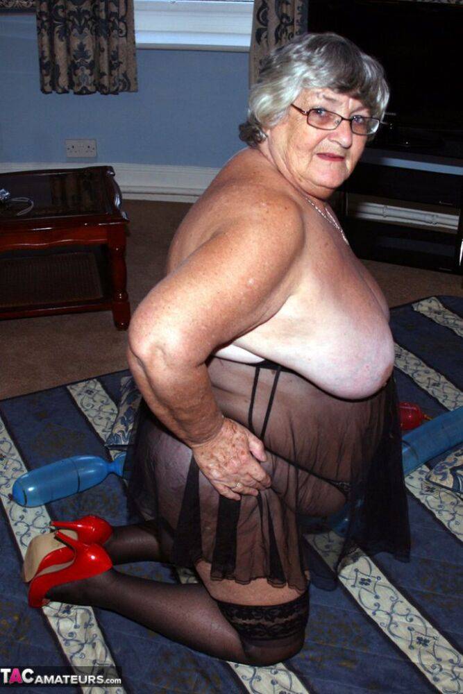 Overweight British woman Grandma Libby plays with balloon dildos in lingerie - #10