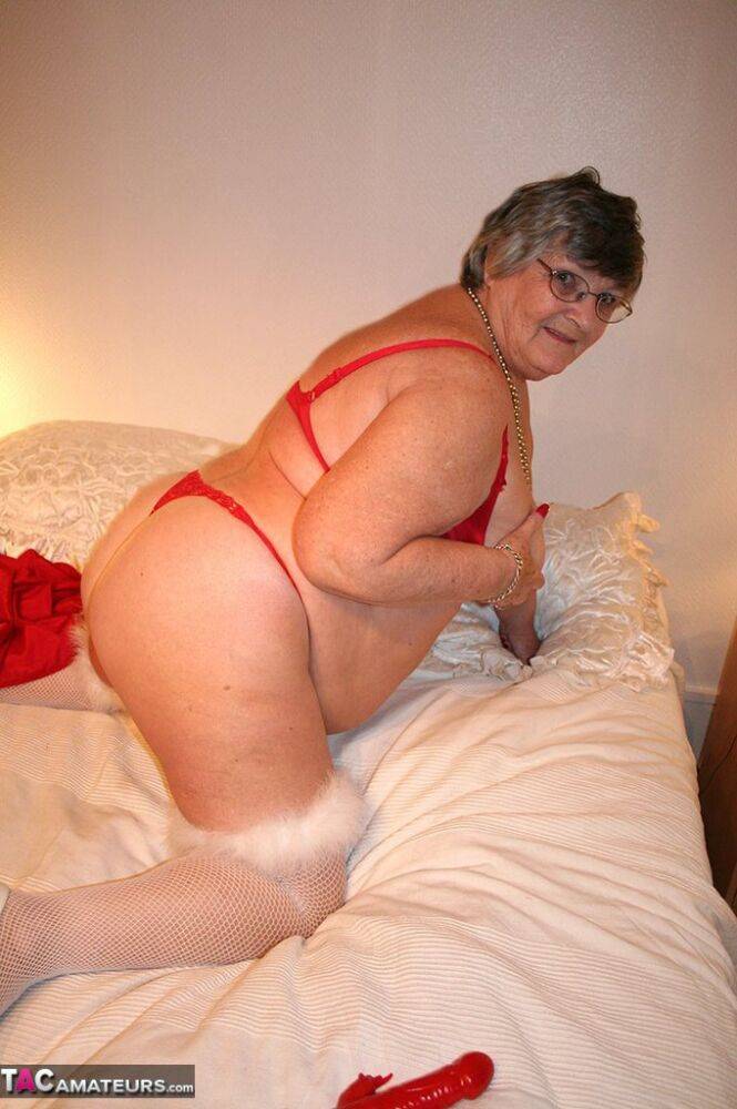 Fat nan Grandma Libby takes a sex toy to her shaved pussy atop her bed - #9