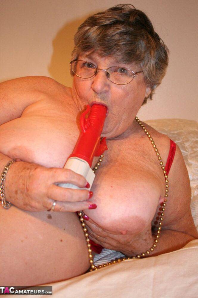 Fat nan Grandma Libby takes a sex toy to her shaved pussy atop her bed - #11