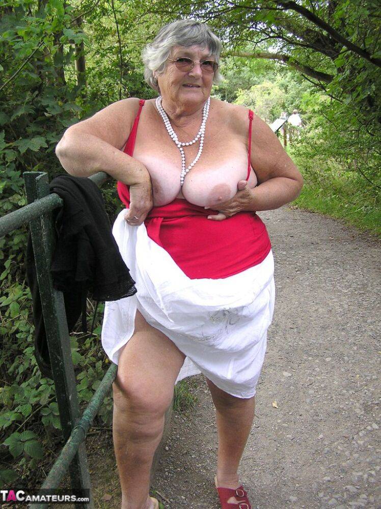 Obese amateur Grandma Libby exposes her boobs on a public walking trail - #1