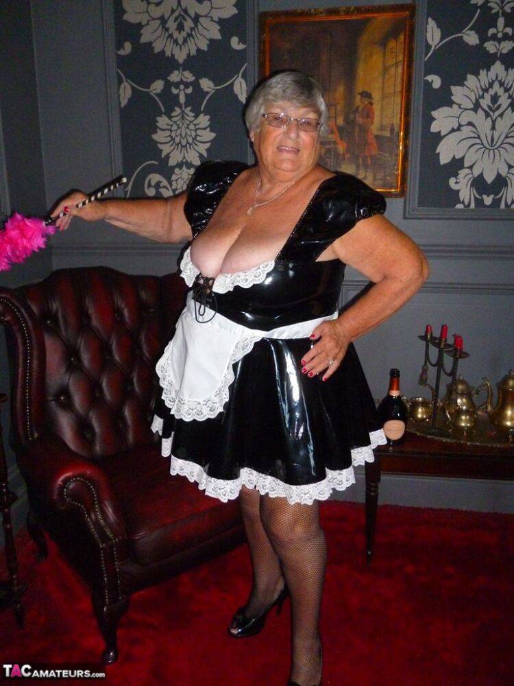 Fat old maid Grandma Libby doffs her uniform to pose nude in stockings - #12