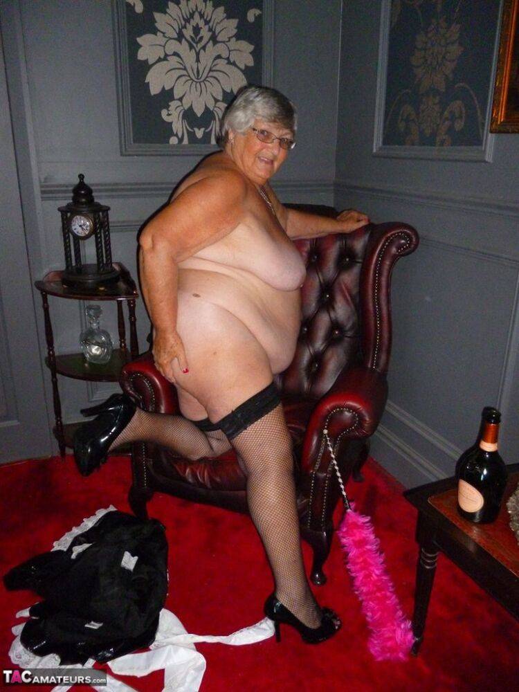 Fat old maid Grandma Libby doffs her uniform to pose nude in stockings - #10