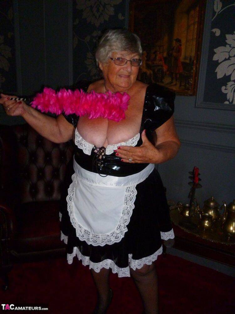 Fat old maid Grandma Libby doffs her uniform to pose nude in stockings - #3