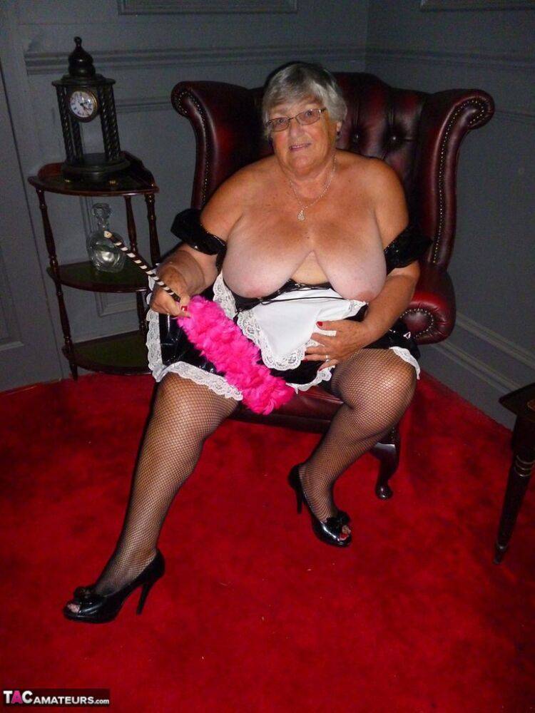 Fat old maid Grandma Libby doffs her uniform to pose nude in stockings - #15