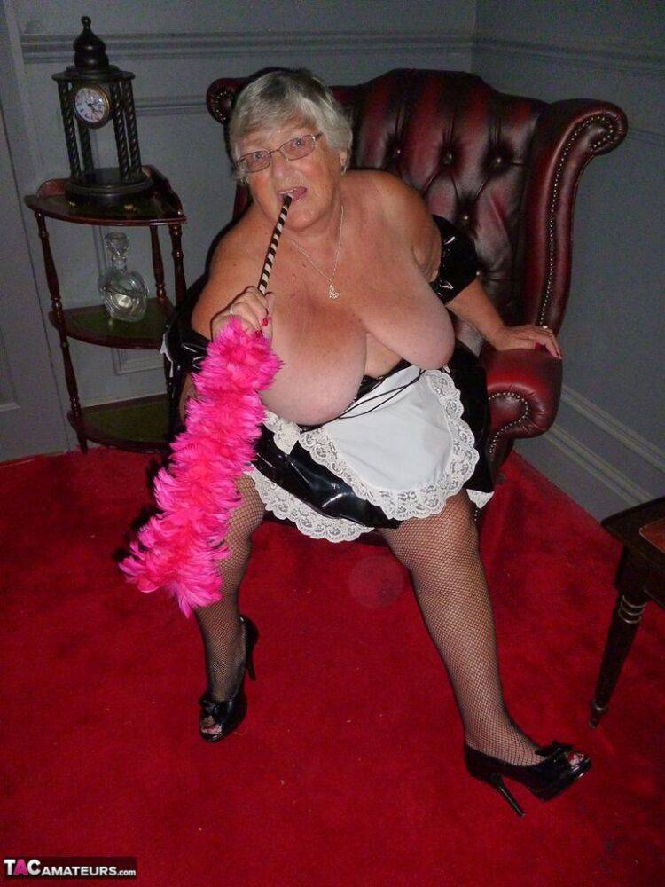 Fat old maid Grandma Libby doffs her uniform to pose nude in stockings - #8