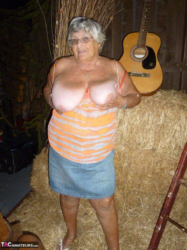 Fat oma Grandma Libby gets naked in a barn while playing acoustic guitar - #4