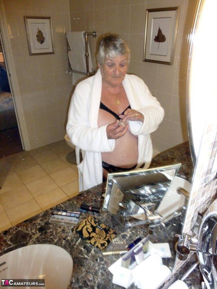 Fat nan Grandma Libby removes a bathrobe to pose nude in a cupless bra - #12