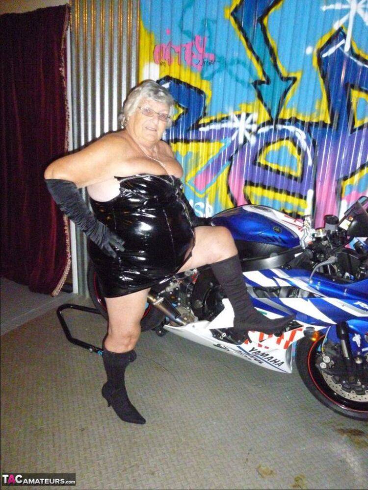 Old fatty Grandma Libby strips to black boots on top of a motorcycle - #14