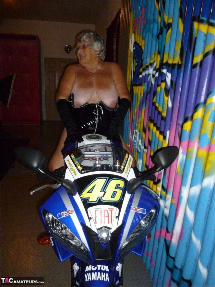Old fatty Grandma Libby strips to black boots on top of a motorcycle - #3