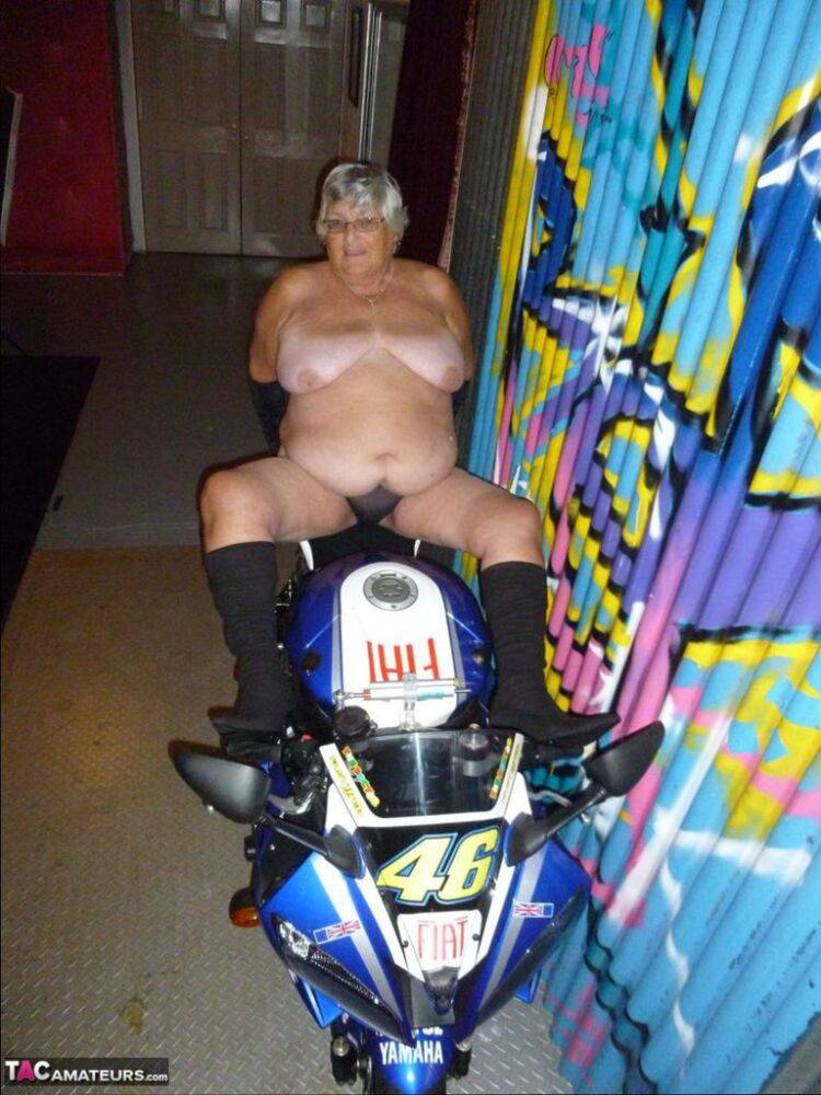 Old fatty Grandma Libby strips to black boots on top of a motorcycle - #5