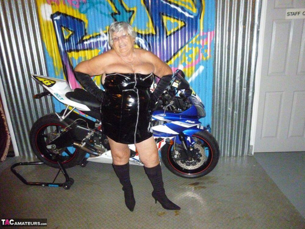 Old fatty Grandma Libby strips to black boots on top of a motorcycle - #9