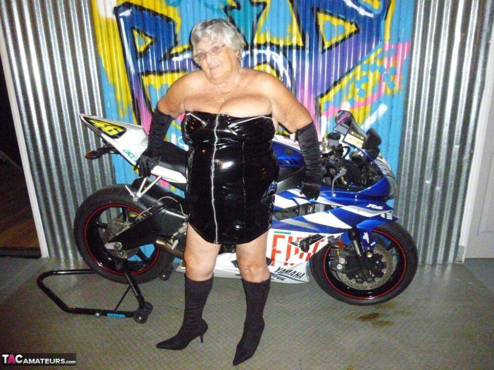 Old fatty Grandma Libby strips to black boots on top of a motorcycle - #1