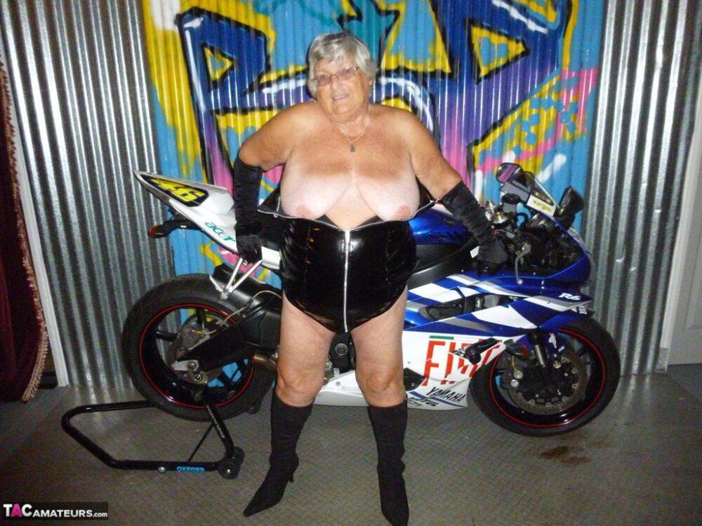 Old fatty Grandma Libby strips to black boots on top of a motorcycle - #4