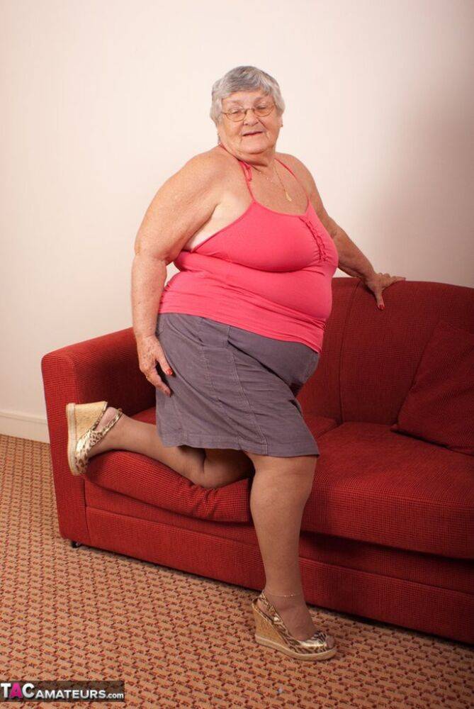 Obese nan Grandma Libby gets totally naked on a red chesterfield - #4