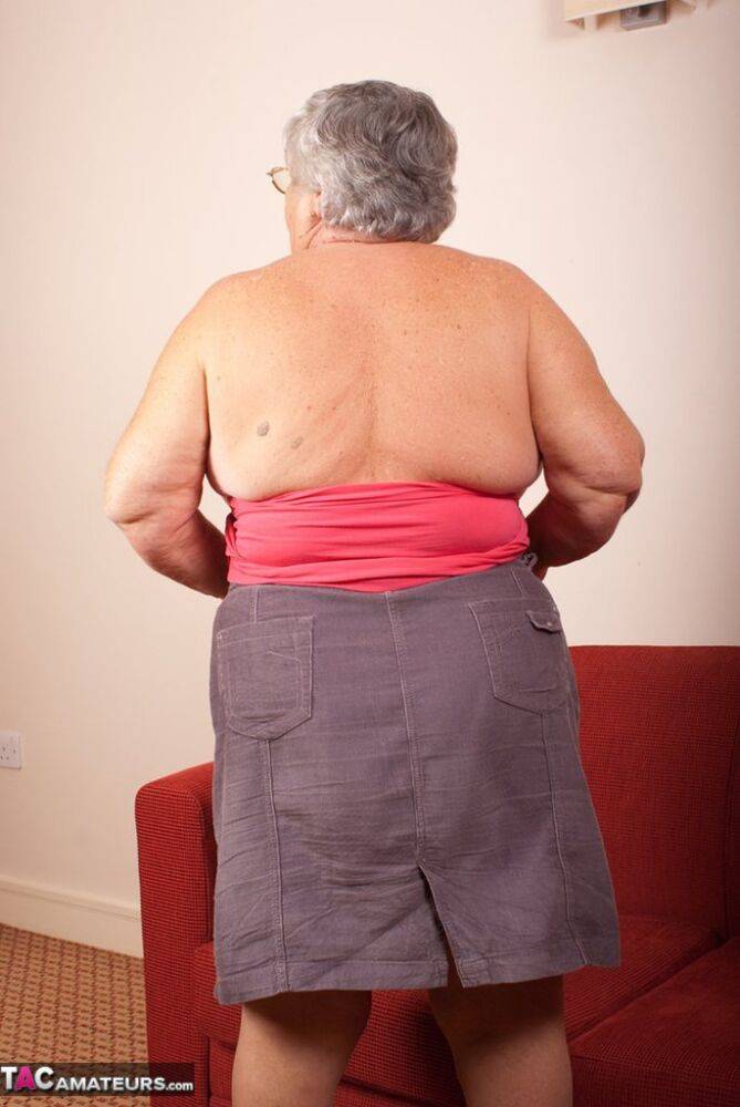 Obese nan Grandma Libby gets totally naked on a red chesterfield - #16