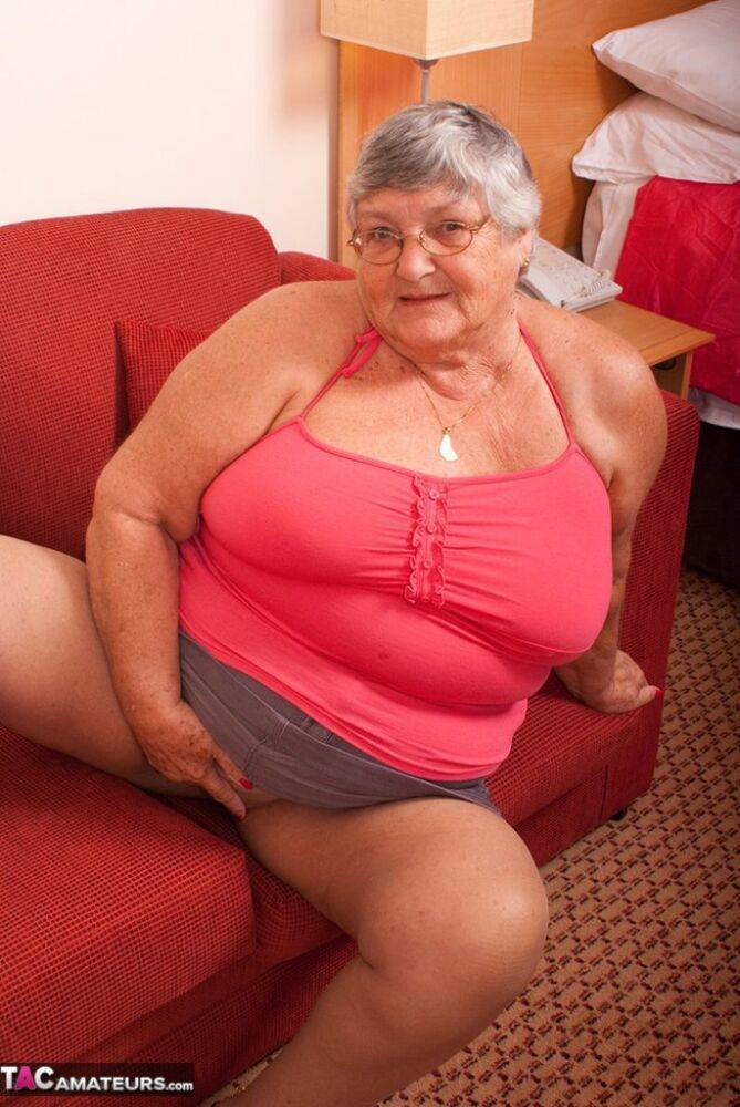 Obese nan Grandma Libby gets totally naked on a red chesterfield - #11