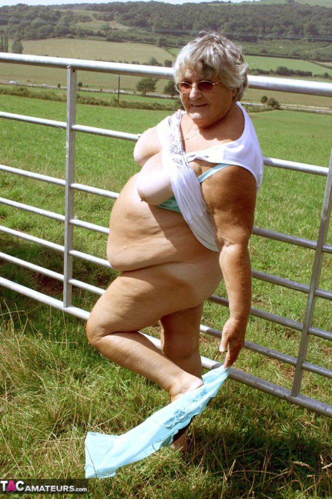 Old British woman Grandma Libby exposes herself next to a field of cattle - #2