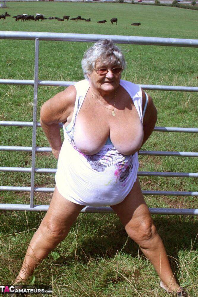 Old British woman Grandma Libby exposes herself next to a field of cattle - #6