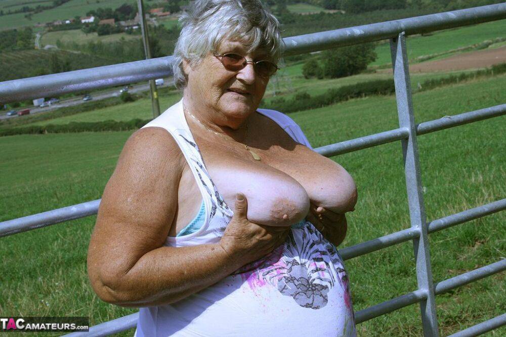Old British woman Grandma Libby exposes herself next to a field of cattle - #3