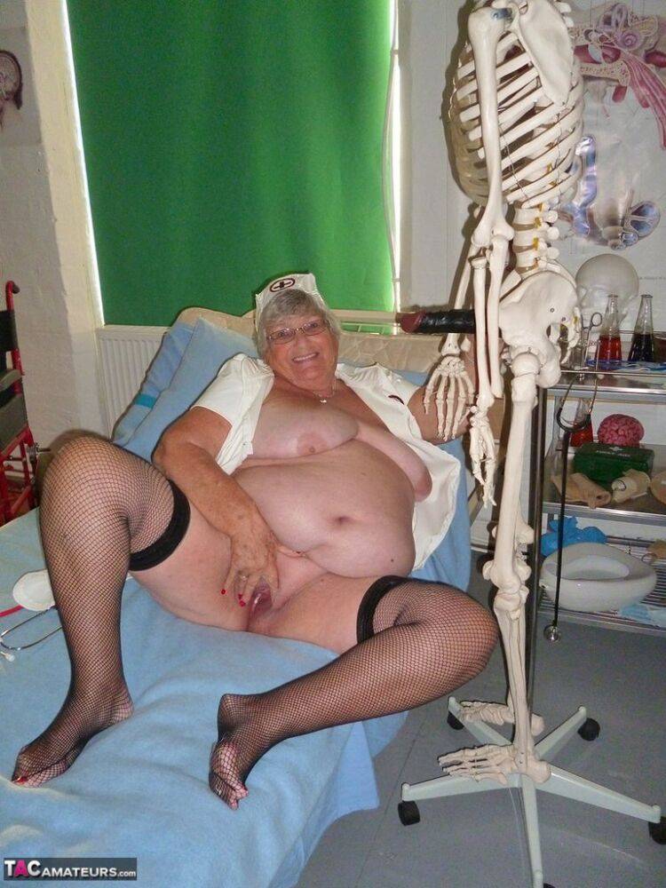 Fat old nurse Grandma Libby attaches a dildo to a skeleton for sexual relief - #4