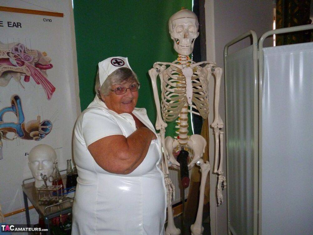 Fat old nurse Grandma Libby attaches a dildo to a skeleton for sexual relief - #10