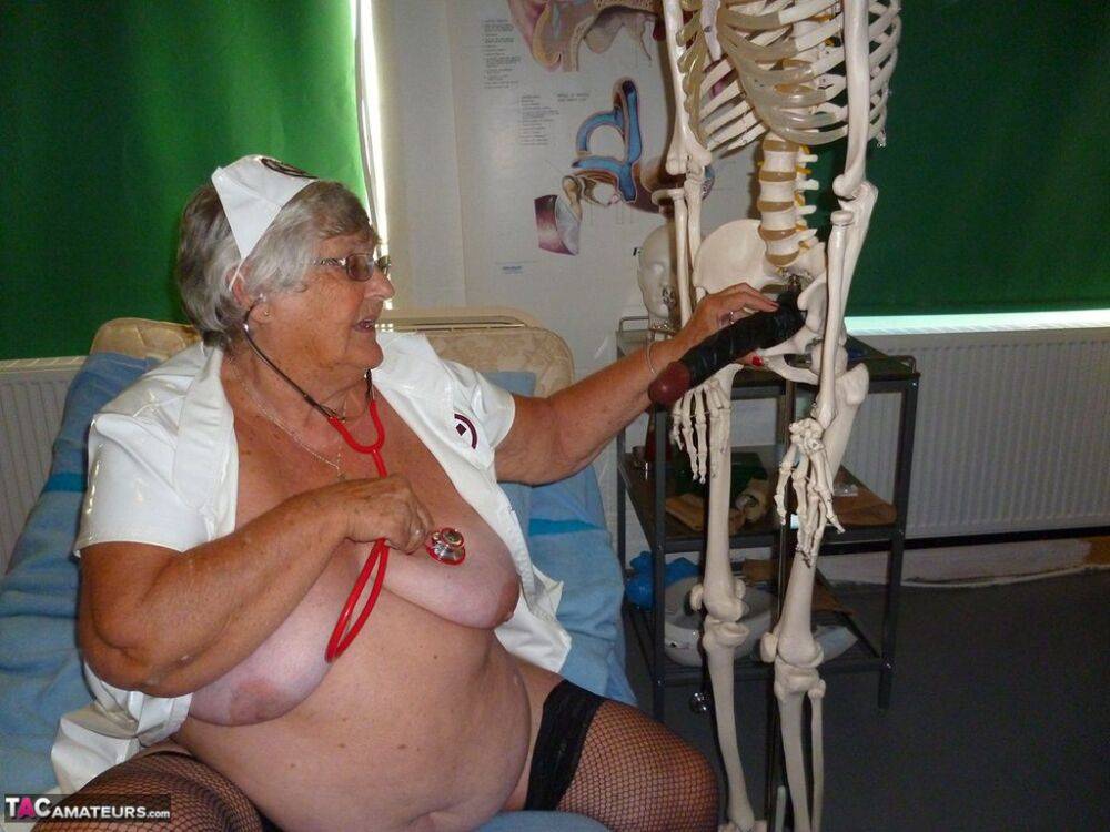 Fat old nurse Grandma Libby attaches a dildo to a skeleton for sexual relief - #3