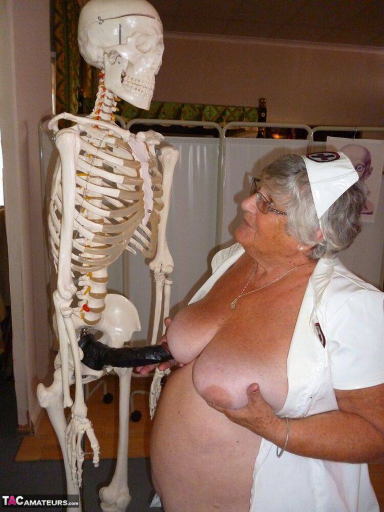 Fat old nurse Grandma Libby attaches a dildo to a skeleton for sexual relief - #7
