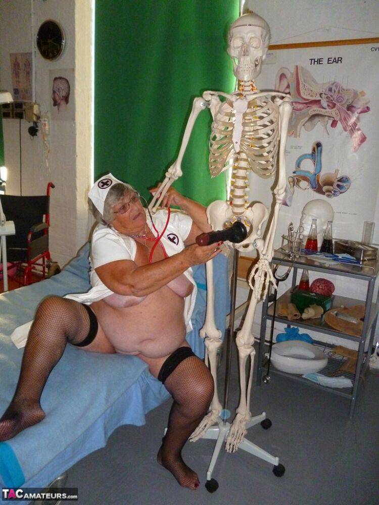 Fat old nurse Grandma Libby attaches a dildo to a skeleton for sexual relief - #5