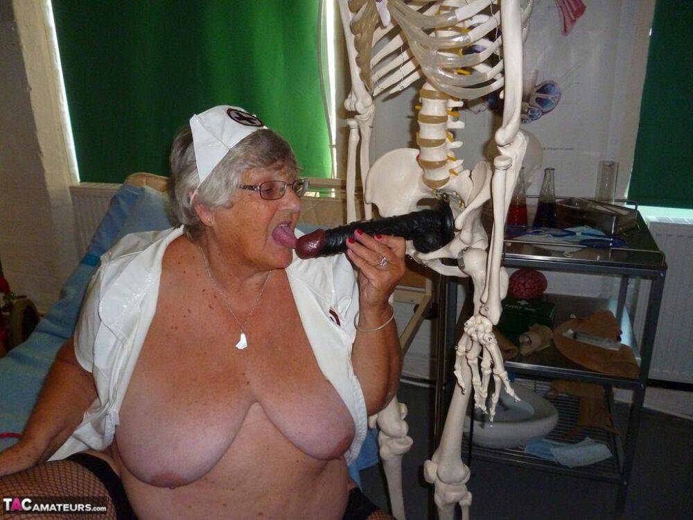 Fat old nurse Grandma Libby attaches a dildo to a skeleton for sexual relief - #11