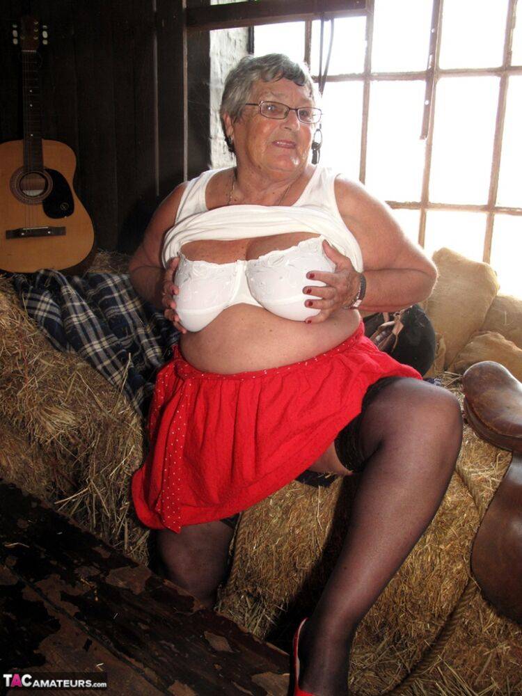 Obese British nan Grandma Libby gets naked in stockings on a bed of straw - #13