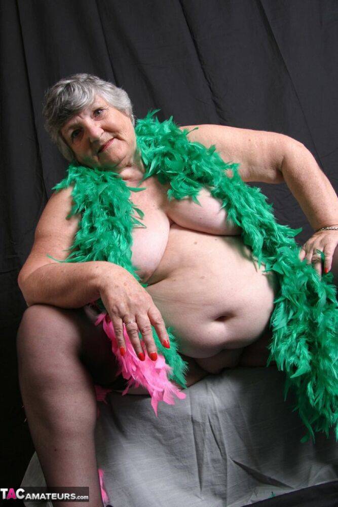 Fat UK amateur Grandma Libby shows her big tits while draped in feather boas - #13