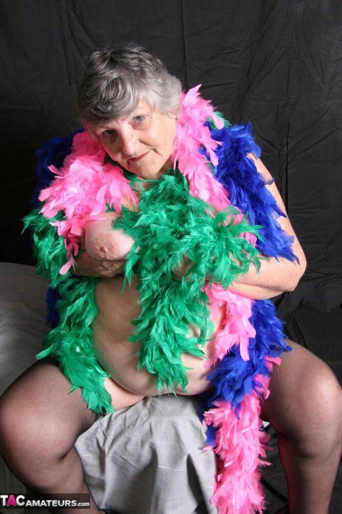 Fat UK amateur Grandma Libby shows her big tits while draped in feather boas - #14