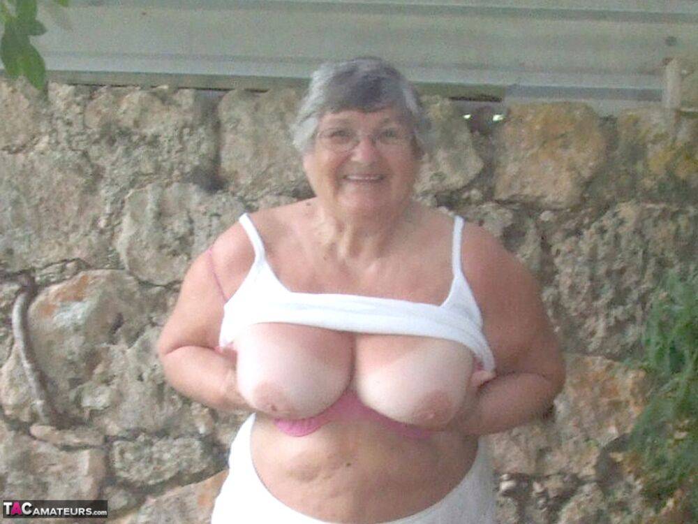 Obese British lady Grandma Libby exposes her large tits underneath a tree - #4