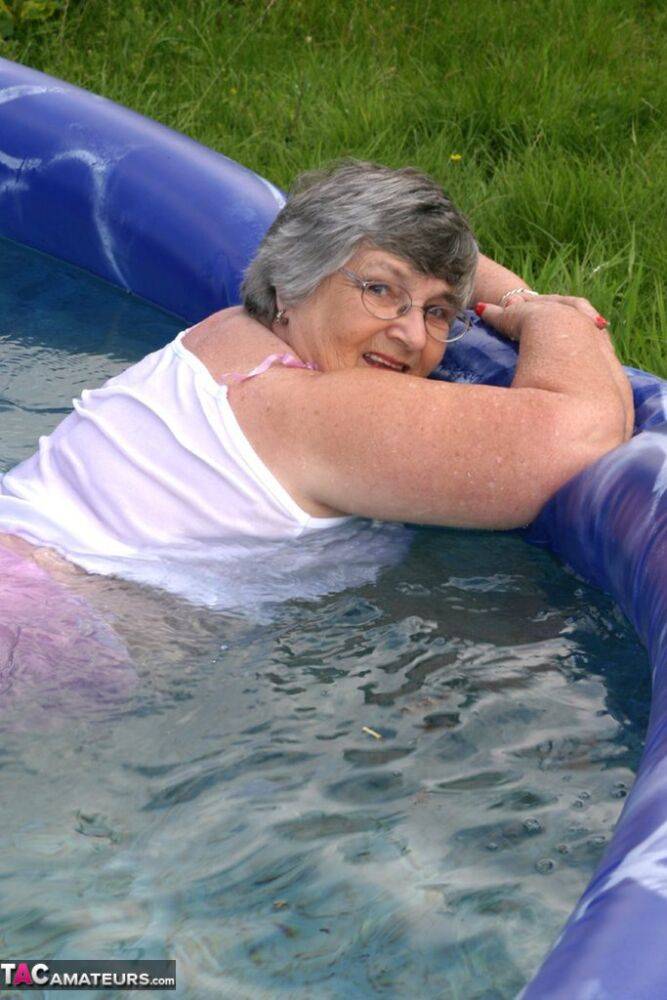 Overweight UK nan Grandma Libby exposes her boobs in a backyard swimming pool - #8