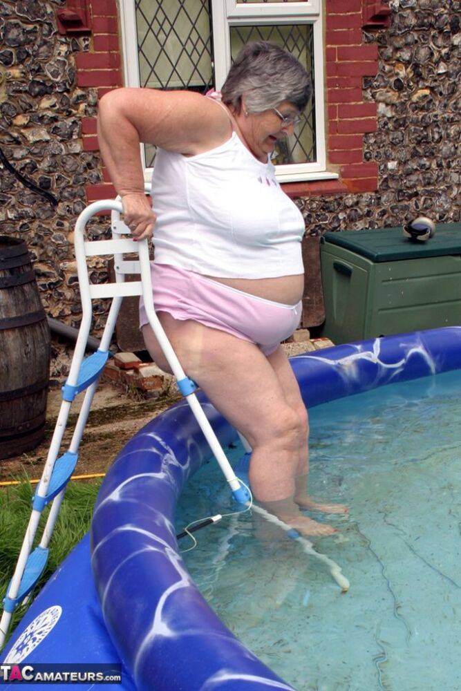 Overweight UK nan Grandma Libby exposes her boobs in a backyard swimming pool - #4