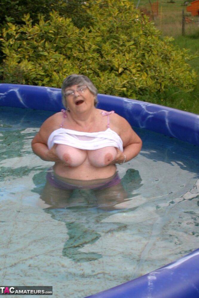 Overweight UK nan Grandma Libby exposes her boobs in a backyard swimming pool - #15