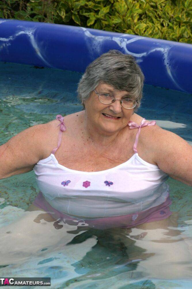 Overweight UK nan Grandma Libby exposes her boobs in a backyard swimming pool - #13